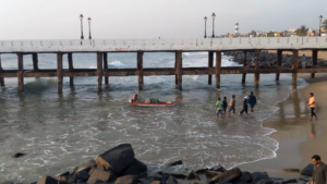 Fisherman bringing his boat to the shore!